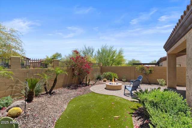 2145 N 88th St, Mesa, AZ 85207 - view of yard with an outdoor fire pit, a fenced backyard, and a patio area