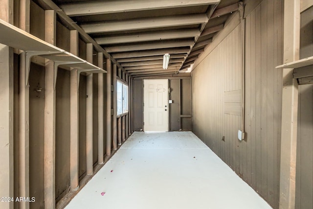 basement with wooden walls