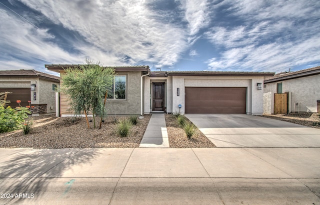 view of front of home with a garage