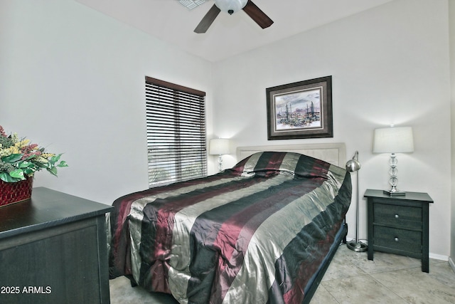 bedroom with tile patterned floors and a ceiling fan