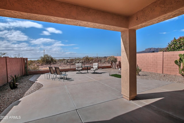 view of patio featuring a fenced backyard