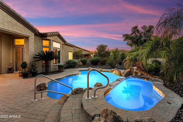 12976 W Plum Rd, Peoria, AZ 85383 - view of pool featuring a patio and a pool with connected hot tub