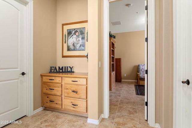 12976 W Plum Rd, Peoria, AZ 85383 - hall featuring light tile patterned floors, visible vents, and baseboards