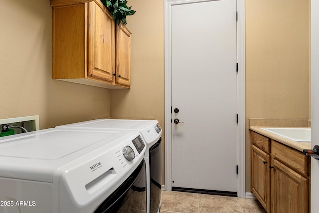 12976 W Plum Rd, Peoria, AZ 85383 - clothes washing area with light tile patterned floors, washing machine and clothes dryer, cabinet space, and a sink