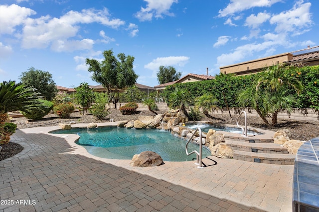 12976 W Plum Rd, Peoria, AZ 85383 - pool featuring a fenced backyard and an in ground hot tub