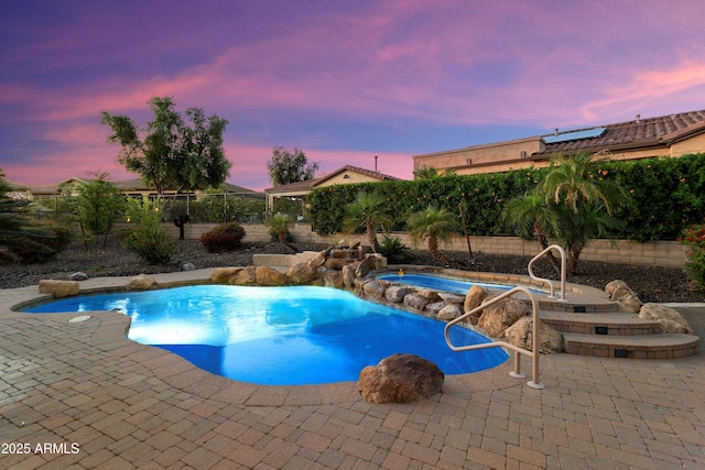 12976 W Plum Rd, Peoria, AZ 85383 - view of swimming pool with a patio, a fenced in pool, a fenced backyard, and an in ground hot tub