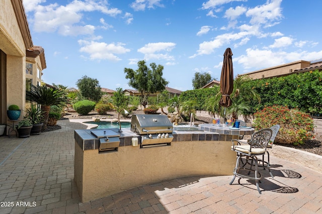 12976 W Plum Rd, Peoria, AZ 85383 - view of patio with an outdoor kitchen, grilling area, and outdoor wet bar