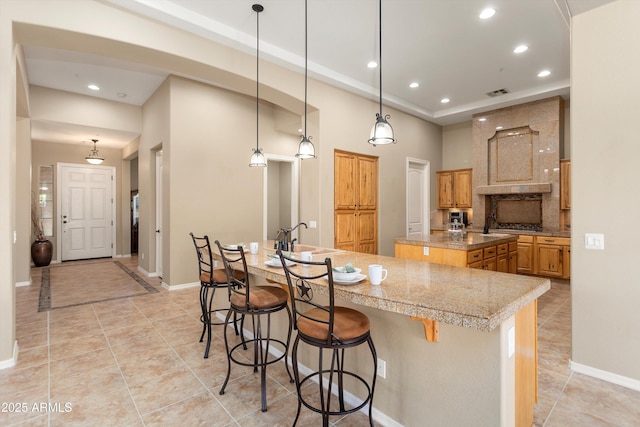 12976 W Plum Rd, Peoria, AZ 85383 - kitchen with recessed lighting, a sink, tile counters, light tile patterned flooring, and visible vents