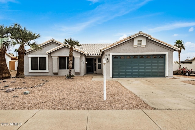 single story home featuring a garage