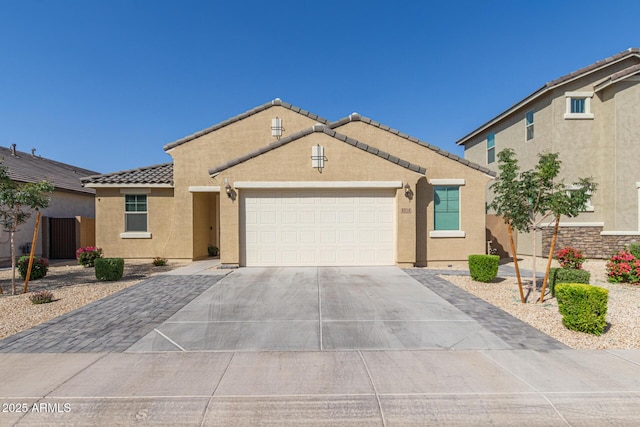 4514 W Hazel Ln, San Tan Valley, AZ 85144 - view of front of home featuring a tile roof, stucco siding, driveway, and a garage