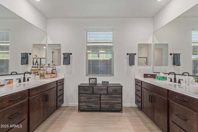 4514 W Hazel Ln, San Tan Valley, AZ 85144 - full bathroom with healthy amount of natural light, baseboards, and two vanities