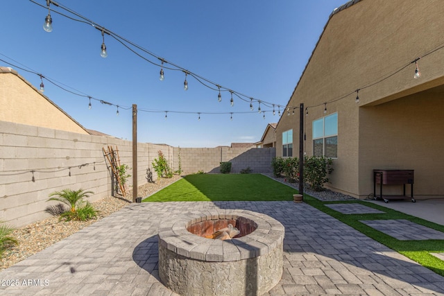 4514 W Hazel Ln, San Tan Valley, AZ 85144 - view of patio / terrace with a fire pit