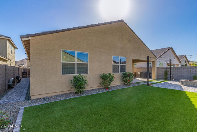 4514 W Hazel Ln, San Tan Valley, AZ 85144 - back of house with a patio area and stucco siding