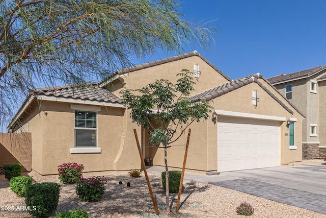 4514 W Hazel Ln, San Tan Valley, AZ 85144 - view of front facade featuring stucco siding, a garage, a tile roof, and driveway