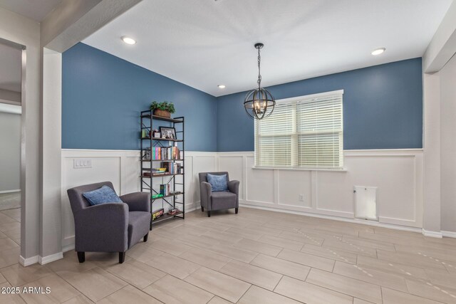 4514 W Hazel Ln, San Tan Valley, AZ 85144 - living area with a wainscoted wall, a chandelier, a decorative wall, and recessed lighting