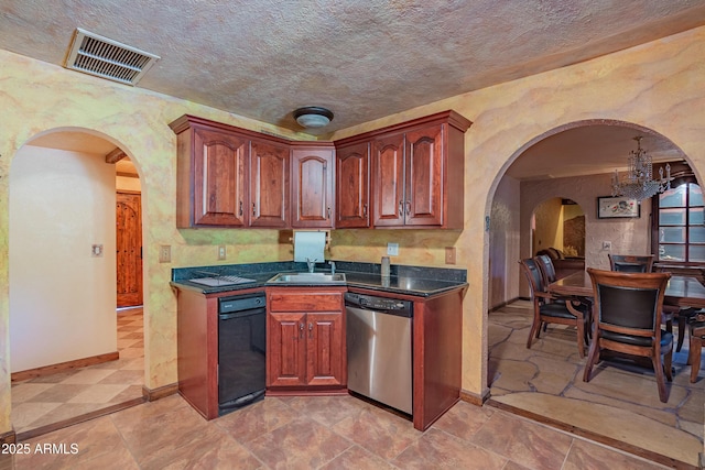 kitchen featuring dishwasher, sink, a chandelier, and a textured ceiling