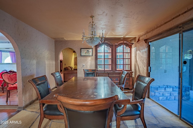 dining room featuring a notable chandelier