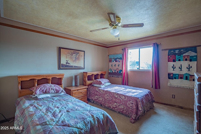 carpeted bedroom featuring ceiling fan and a textured ceiling