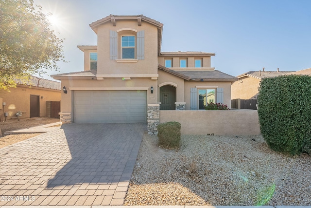 view of front of property with a garage