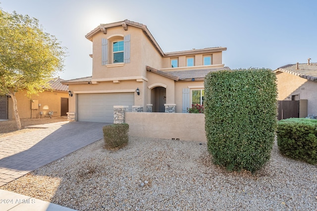 view of front of property featuring a garage