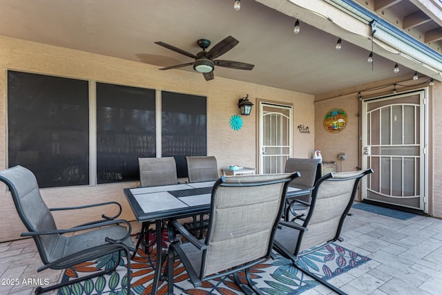 view of patio / terrace with ceiling fan