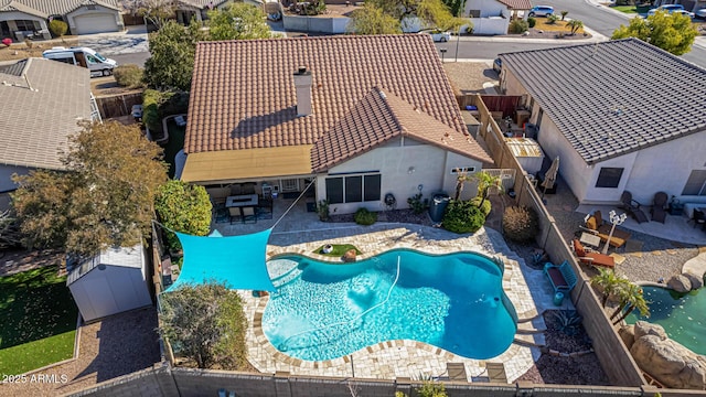 view of swimming pool featuring a patio area