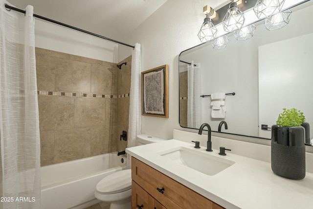 full bathroom featuring vanity, shower / bath combo, and toilet