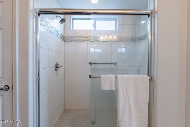 bathroom featuring walk in shower