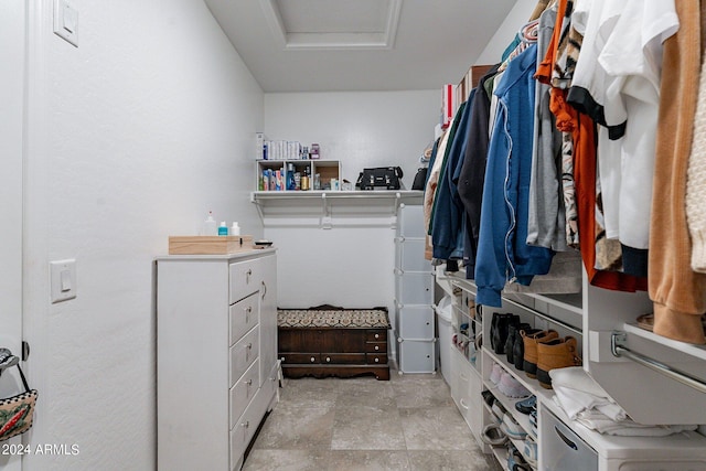 spacious closet with attic access