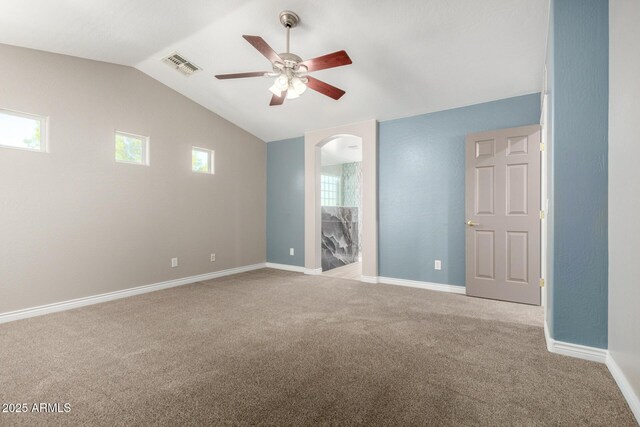 1918 E Megan St, Gilbert, AZ 85295 - empty room featuring arched walkways, carpet floors, ceiling fan, and lofted ceiling