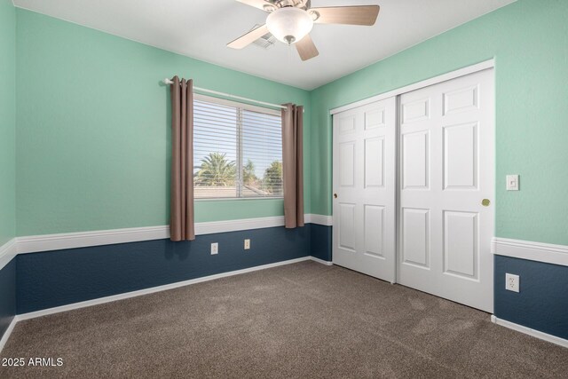 1918 E Megan St, Gilbert, AZ 85295 - unfurnished bedroom featuring carpet flooring, a closet, and a ceiling fan