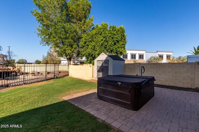1918 E Megan St, Gilbert, AZ 85295 - fenced backyard featuring a hot tub, a patio, and a storage shed