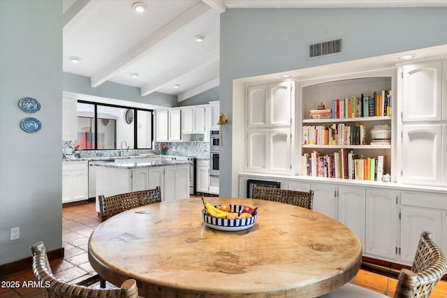 84 Biltmore Est, Phoenix, AZ 85016 - dining room with vaulted ceiling with beams and visible vents