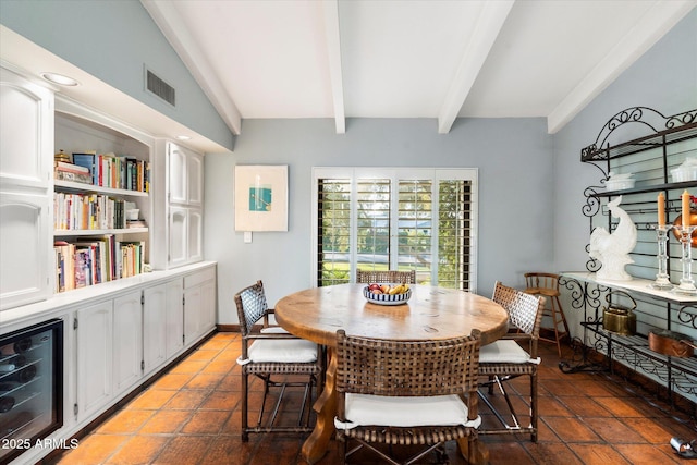 84 Biltmore Est, Phoenix, AZ 85016 - dining room with visible vents, beam ceiling, and wine cooler