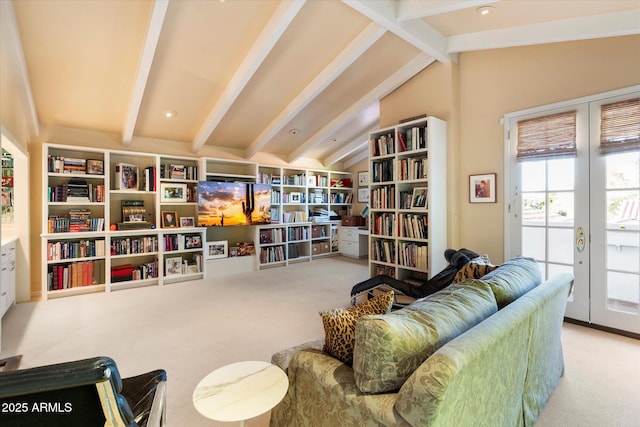 84 Biltmore Est, Phoenix, AZ 85016 - sitting room with french doors, vaulted ceiling with beams, wall of books, and carpet floors