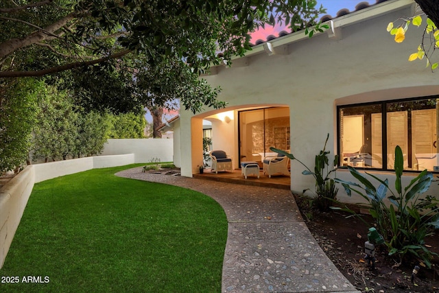 84 Biltmore Est, Phoenix, AZ 85016 - yard at dusk featuring a patio area and fence