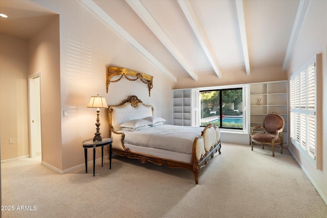 84 Biltmore Est, Phoenix, AZ 85016 - carpeted bedroom with baseboards and vaulted ceiling with beams