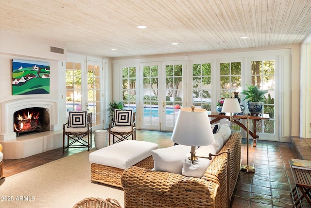 84 Biltmore Est, Phoenix, AZ 85016 - sunroom with french doors, visible vents, and a healthy amount of sunlight
