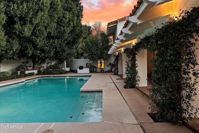 84 Biltmore Est, Phoenix, AZ 85016 - pool at dusk with an outdoor pool and a patio