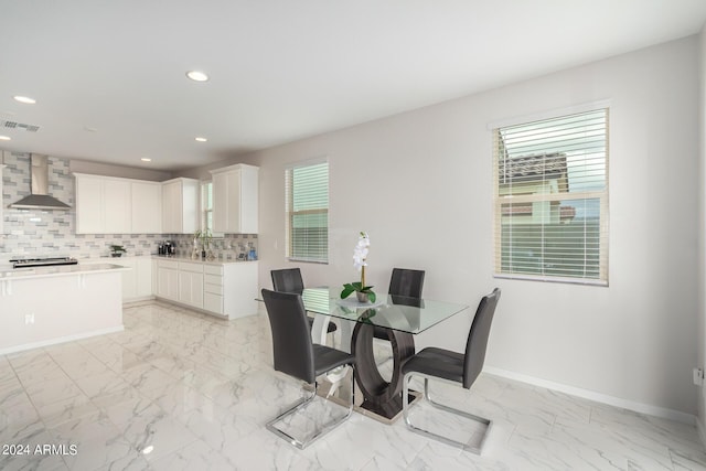 dining area with recessed lighting, marble finish floor, visible vents, and baseboards