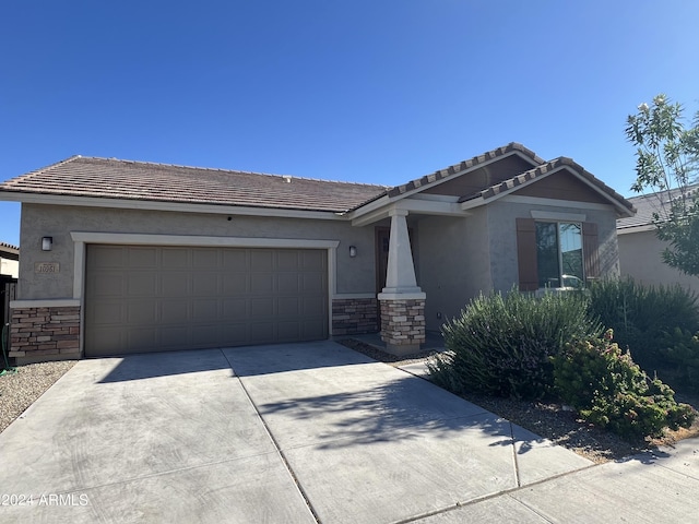 single story home with a garage