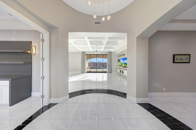 26204 S Washington St, Chandler, AZ 85249 - hallway featuring marble tiled floors, coffered ceiling, beam ceiling, and inlaid floor details