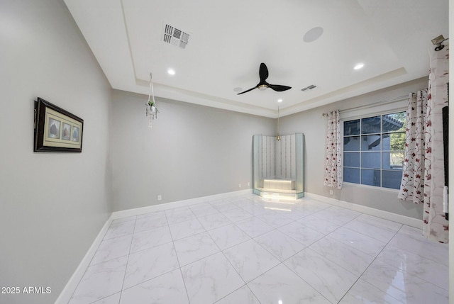 26204 S Washington St, Chandler, AZ 85249 - empty room with a raised ceiling, ceiling fan, recessed lighting, and marble look tile flooring