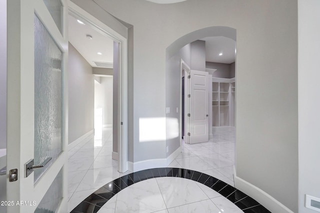 26204 S Washington St, Chandler, AZ 85249 - corridor with marble tiled flooring, arched walkways, and recessed lighting