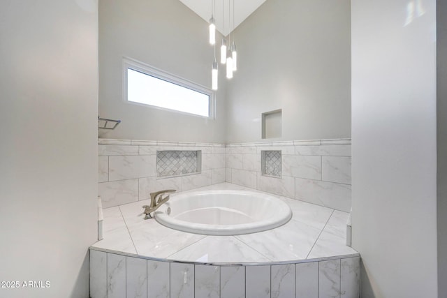 26204 S Washington St, Chandler, AZ 85249 - bathroom featuring a bath and vaulted ceiling