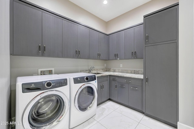 26204 S Washington St, Chandler, AZ 85249 - washroom with cabinet space, light marble finish floors, and washer and clothes dryer