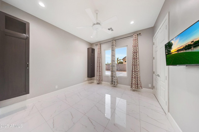 26204 S Washington St, Chandler, AZ 85249 - unfurnished room featuring light marble finish floors, recessed lighting, and ceiling fan