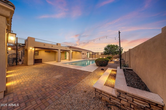 26204 S Washington St, Chandler, AZ 85249 - view of pool featuring stairway, a fenced backyard, and a patio