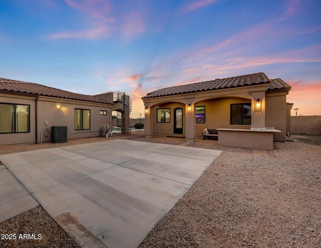 26204 S Washington St, Chandler, AZ 85249 - back of house with a tiled roof and stucco siding