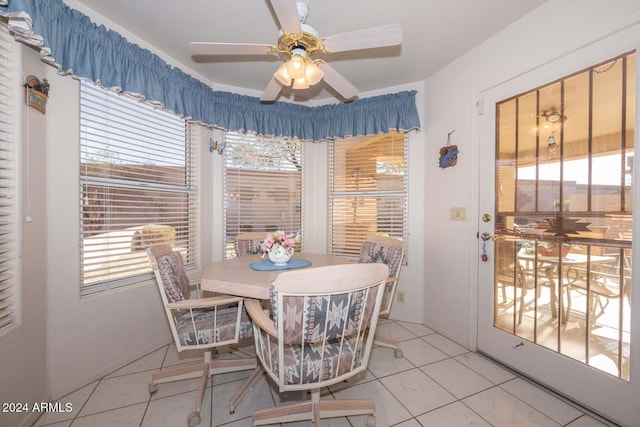 dining room featuring light tile patterned floors and ceiling fan